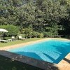 Die Ferienvilla in der Toskana Compignano Barn mit Pool umgeben von Obstbäumen und Olivenhainen