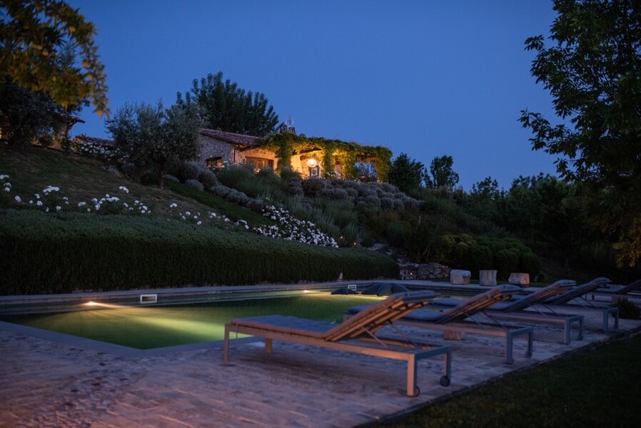 La Segreta Pool and Farmhouse at Night