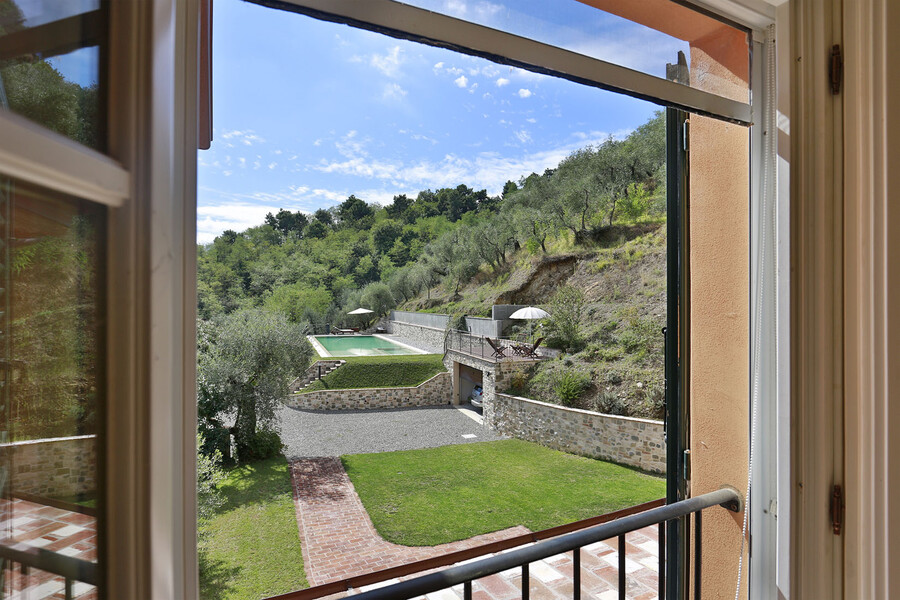View over the private pool in the vacation villa in Lucca