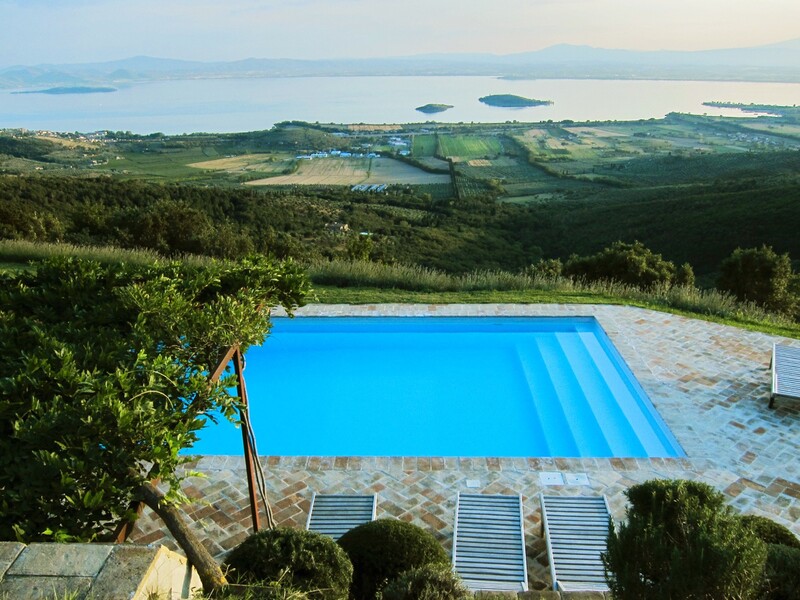 View over the pool and the Trasimeno Lake from Casa Bramasole