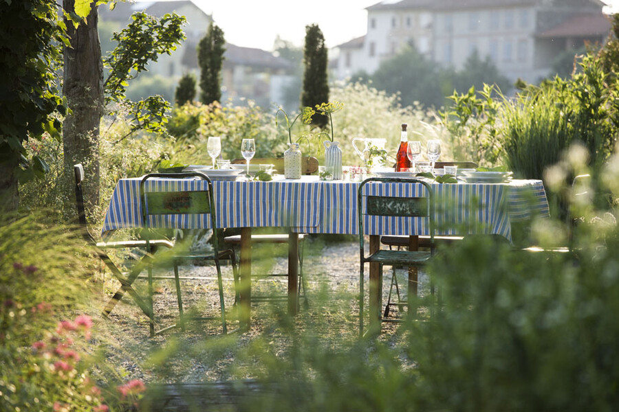 Outdoor table in the holiday villa in Piedmont Cascina Monferrato