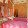 Geschmackvolles Schlafzimmer mit Himmelbett in der Villa Lavacchio