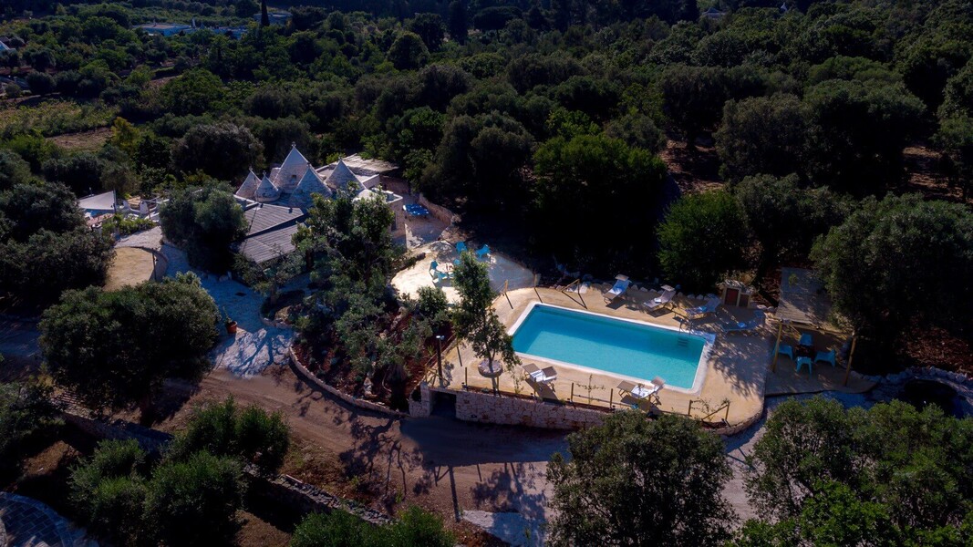 Trulli-of-stars-drone-view-swimming-pool