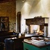 Livingroom with large fireplace in Casa Bramasole