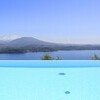 Atemberaubender Blick auf den See vom privatem Pool in der Villa Falcone